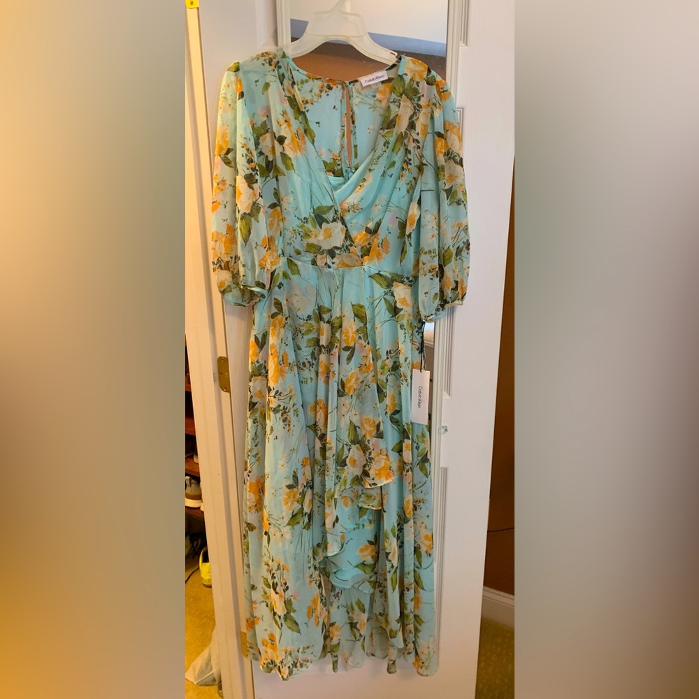 New Calvin Klein Dress with layered bottom hem.